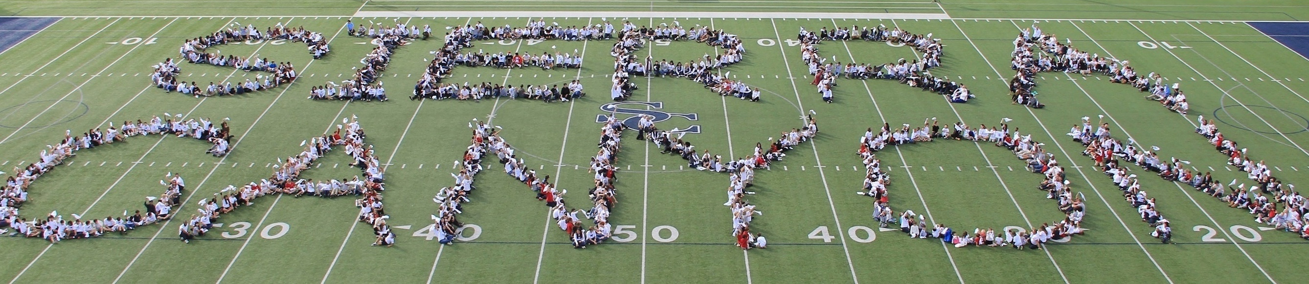 The faculty and student body spell out Sierra Canyon on the football field on Opening Day. Support the school annual fund!